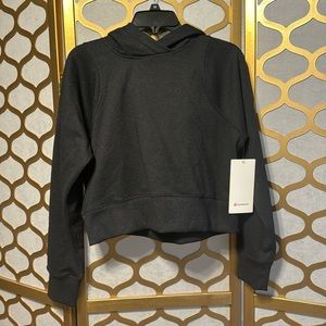 Lululemon hoodie loungeful cropped hoodie Spark. New with tags. Never worn.
